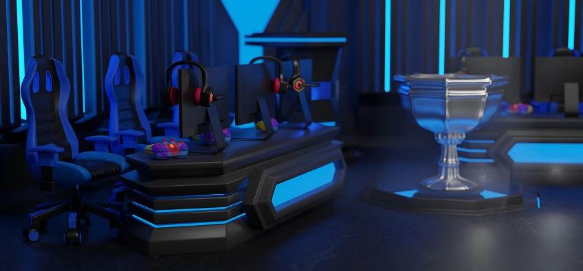 Een futuristische gametafel met meerdere beeldschermen, ergonomische stoelen en een led-trofee, allemaal verlicht door blauw neonlicht.